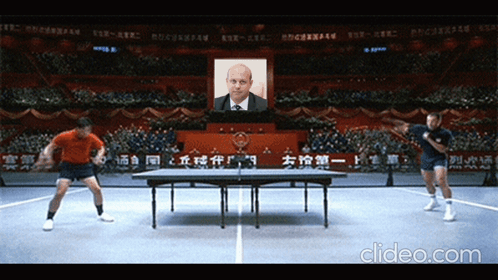 Men Playing Ping Pong