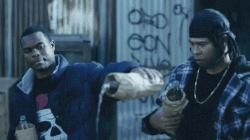 Men Pouring Into Hand With Oon Graffiti