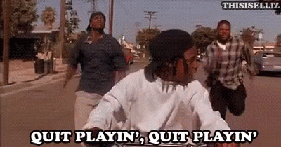 Men Riding Bikes Saying Quit Playin