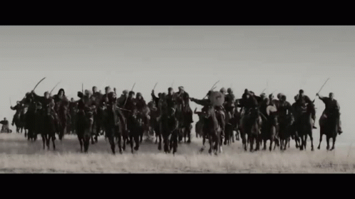 Men Riding Horse Fighting War GIF