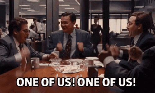 Men Sitting Around Table GIF