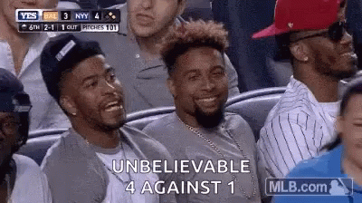 Men Sitting in Baseball Stands