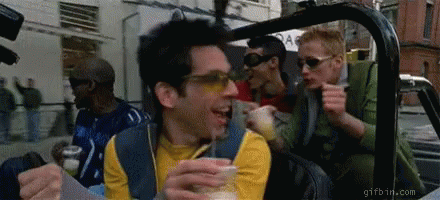 Men Sitting in Car With Drink