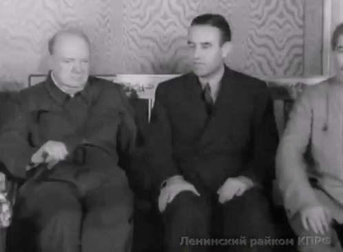 Men Sitting On Couch In Black And White GIF