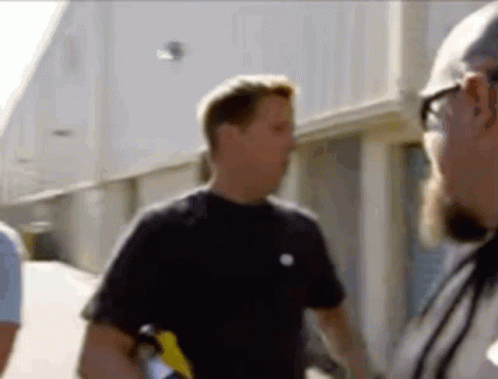 Men Standing And Talking GIF