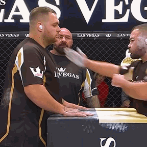 Men Standing in Boxing Ring with Vegas Shirt