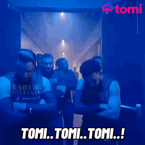 Men Standing in Dark Hallway