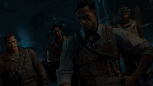 Men Standing in Dark Room with Blood