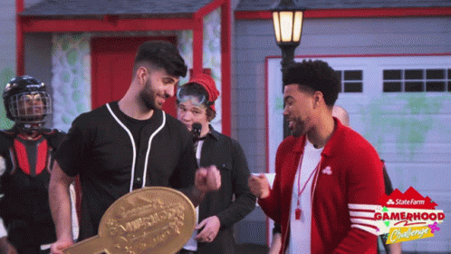 Men Standing In Front Of Garage With State Farm Sign GIF