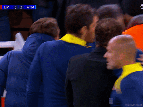 Men Standing In Front Of Scoreboard Liv 3 2 Atm GIF