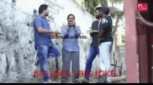 Men Standing In Front Of Wall Saying Big Joke GIF