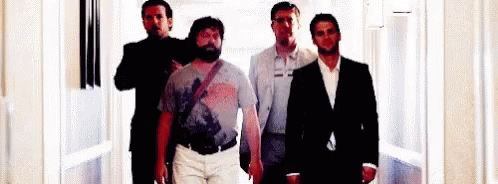 Men Standing in Hallway
