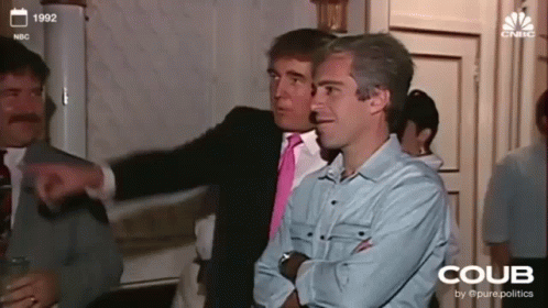 Men Standing in Room With CNBC