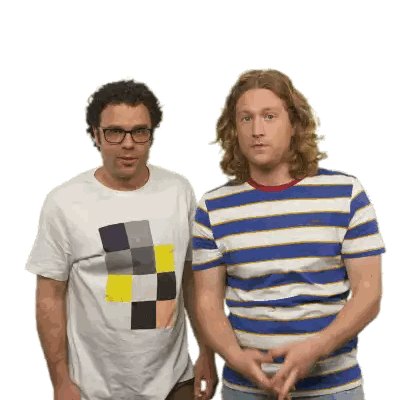 Men Standing Next to Each Other