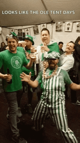 Men Under Tent in Green Celtics Shirt