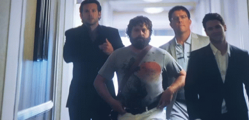 Men Walking Down Hallway GIF