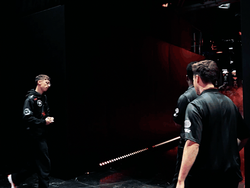 Men Walking in Smoke-Filled Room