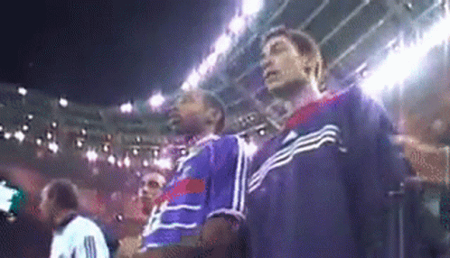 Men Watching Game In Stadium GIF