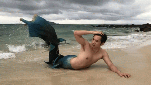 Mermaid Guy On Beach GIF