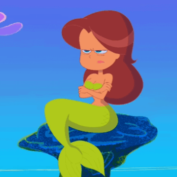 Mermaid Sitting on Rock Crossed Arms