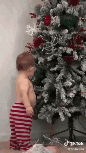 Merry Christmas Funny Baby Look At The Camera GIF
