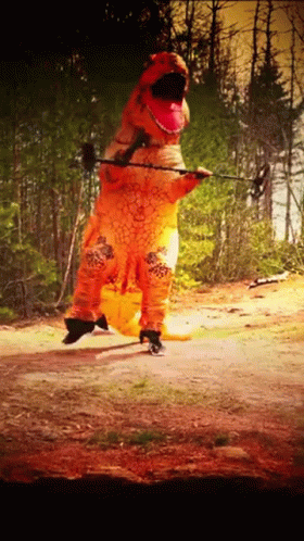 Metal Rocker Dinosaur Costume GIF