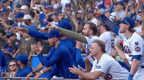 Mets Baseball Players Sitting in Dugout