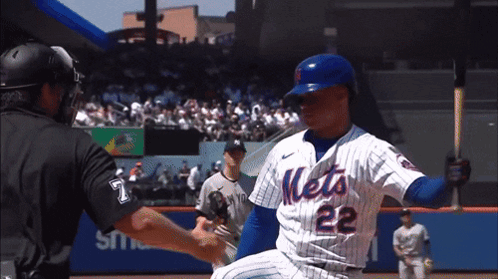 Mets Player Number 22 Shakes Hands With Umpire