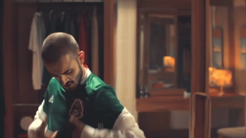 Mexico Soccer Player Kissing Jersey Logo GIF