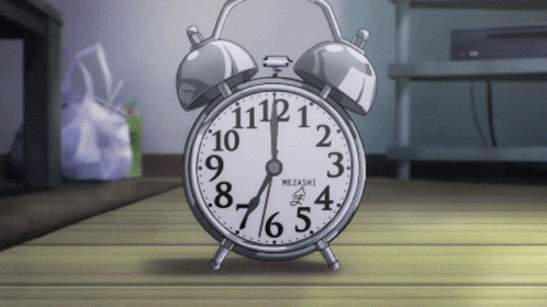 Mezashi Alarm Clock on Wooden Table