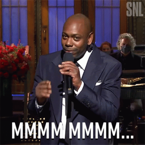 Mhmmm Dave Chappelle Rubbing Arms GIF