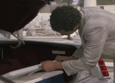 Miami Vice Ricardo Tubbs Discovers Drugs GIF