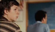 Michael Cera Of Superbad Is Looking On His Classmate GIF
