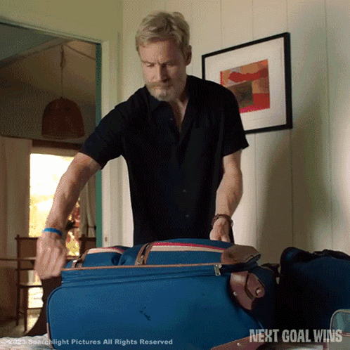 Michael Fassbender Packing Bags GIF