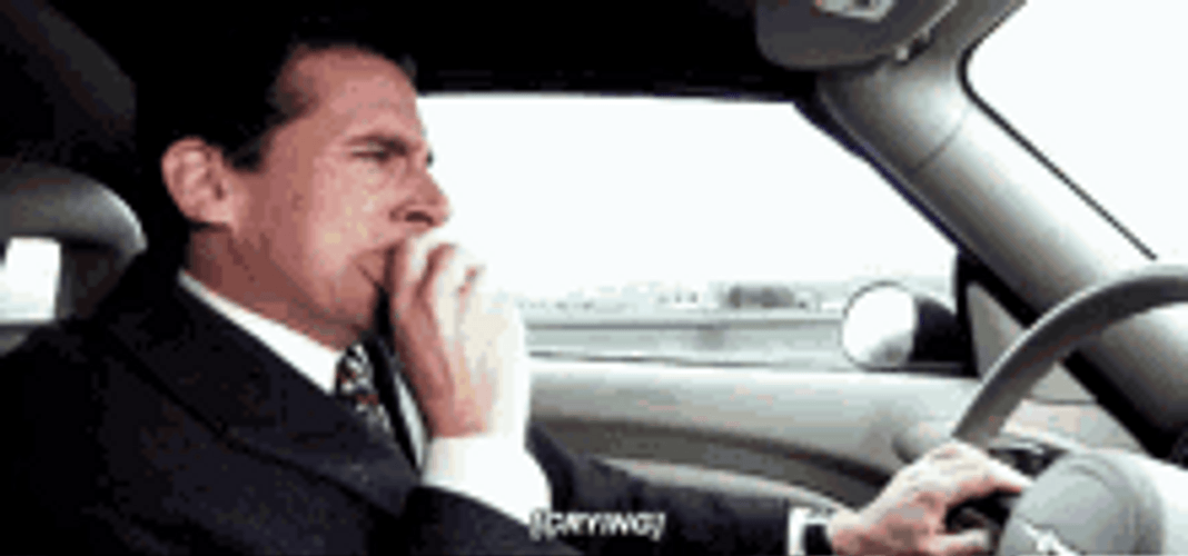 Michael Scott Crying And Eating While Driving GIF