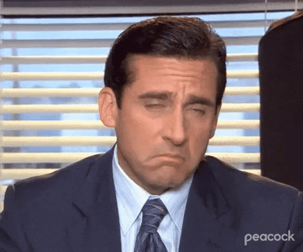 Michael Scott Trying Not To Cry In The Office GIF