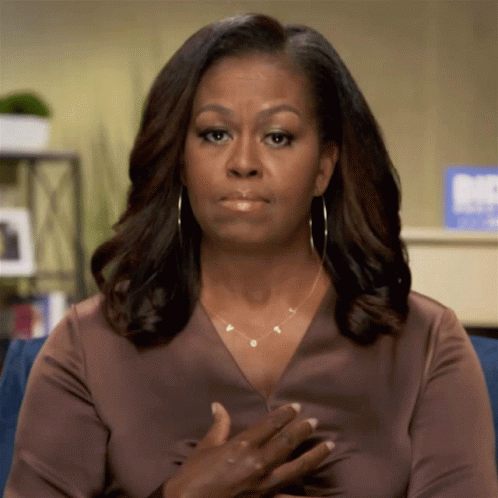 Michelle Obama In Brown Shirt And Necklace GIF