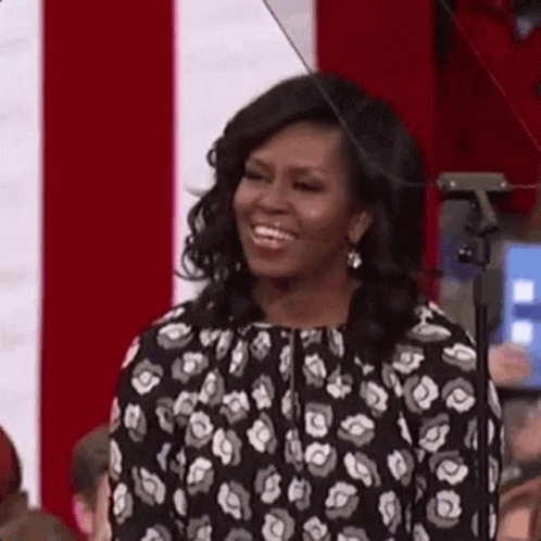 Michelle Obama Smiling Laughing In Front Of Crowd GIF