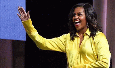 Michelle Obama Waving in Yellow Shirt
