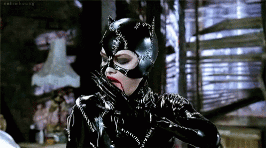 Michelle Pfeiffer Catwoman Licking Hand GIF