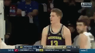 Michigan Basketball Player Talking To Another GIF