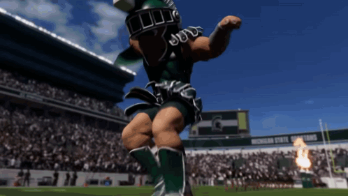 Michigan State Spartans Mascot Running on Field