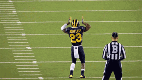 Michigan Wolverines Player Jumping GIF