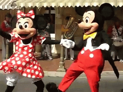 Mickey And Minnie Mouse Dancing In Disneyland GIF