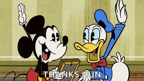 Mickey Mouse And Donald Duck Are Standing Next To Each Other And Waving At The Camera . GIF