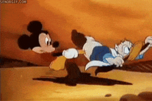 Mickey Mouse and Donald Duck Running in Desert