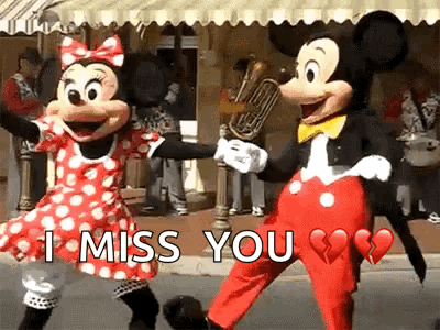 Mickey Mouse And Minnie Mouse Dancing Holding Hands GIF