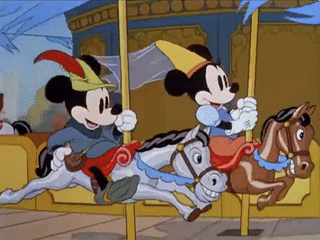 Mickey Mouse and Minnie Mouse Riding a Merry-Go-Round