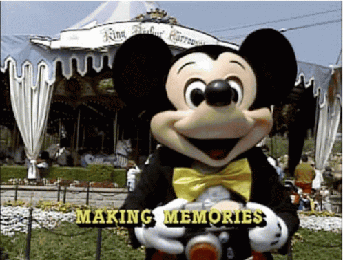Mickey Mouse Holding Camera Making Memories
