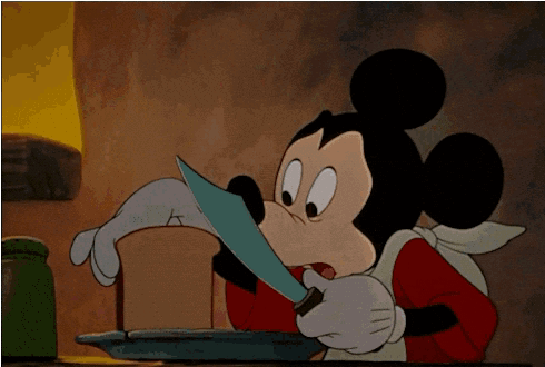 Mickey Mouse Holding Knife And Plate GIF